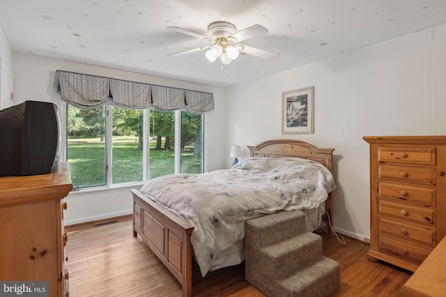 1316 Carpenters Point Rd, Perryville, MD 21903 - bedroom with light wood-style flooring, baseboards, and ceiling fan