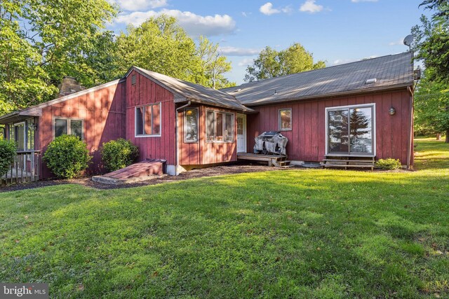 1316 Carpenters Point Rd, Perryville, MD 21903 - back of property with a chimney, a lawn, and entry steps