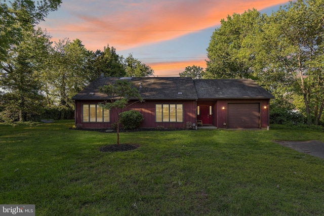 1316 Carpenters Point Rd, Perryville, MD 21903 - view of front facade featuring an attached garage, a lawn, driveway, and board and batten siding