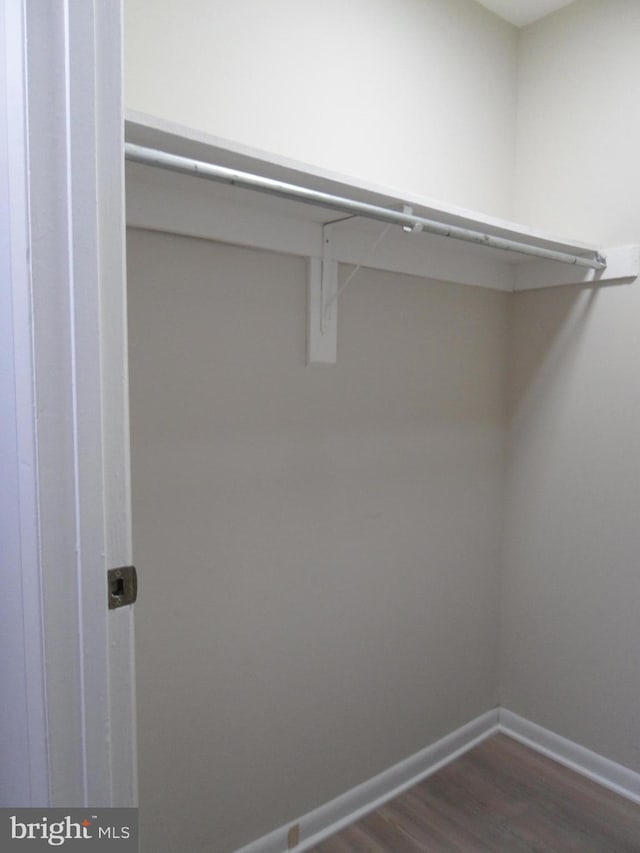 6087 Majors Ln Unit 1, Columbia, MD 21045 - walk in closet with dark wood finished floors