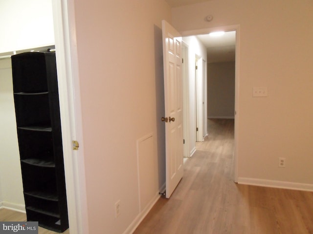 6087 Majors Ln Unit 1, Columbia, MD 21045 - corridor with light wood-type flooring and baseboards