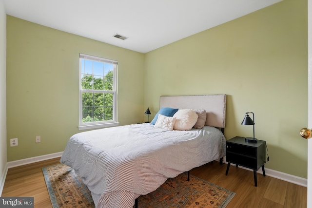11438 Abner Ave, Fairfax, VA 22030 - bedroom featuring light wood-style flooring and baseboards