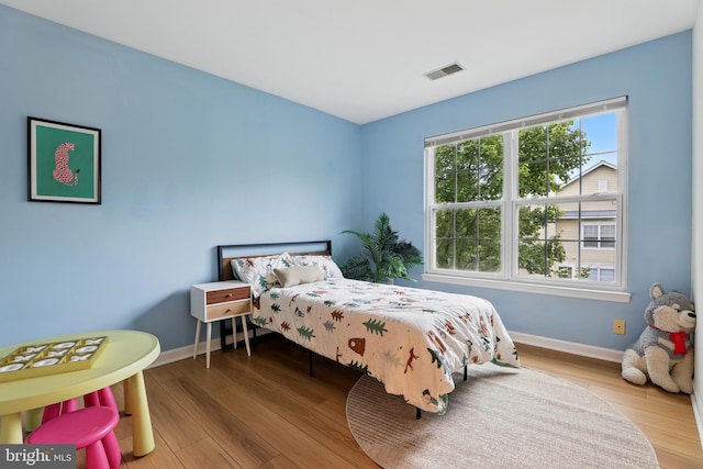 11438 Abner Ave, Fairfax, VA 22030 - bedroom featuring baseboards and wood finished floors