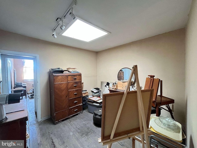 1744 Llewelyn Ave, Baltimore, MD 21213 - office area with light wood-style floors and track lighting