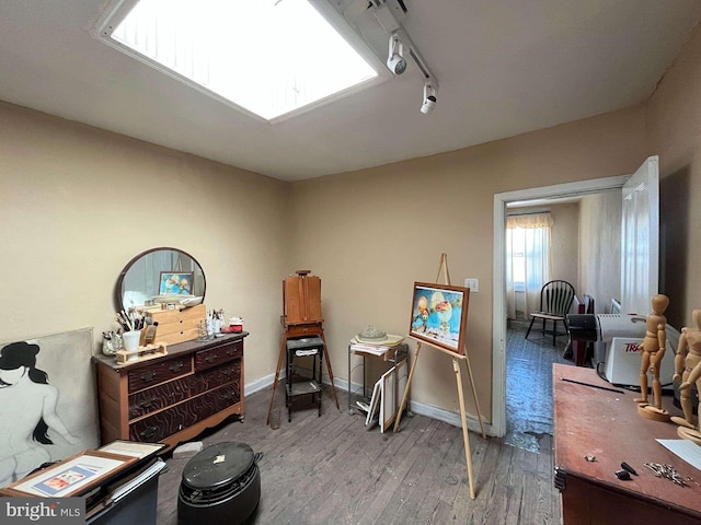 1744 Llewelyn Ave, Baltimore, MD 21213 - misc room with hardwood / wood-style flooring, rail lighting, and baseboards