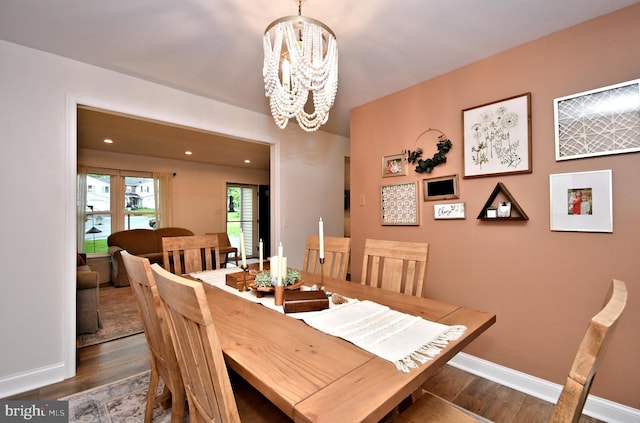 16 Grove Cir, Sellersville, PA 18960 - dining room featuring a chandelier, dark wood-style floors, and baseboards
