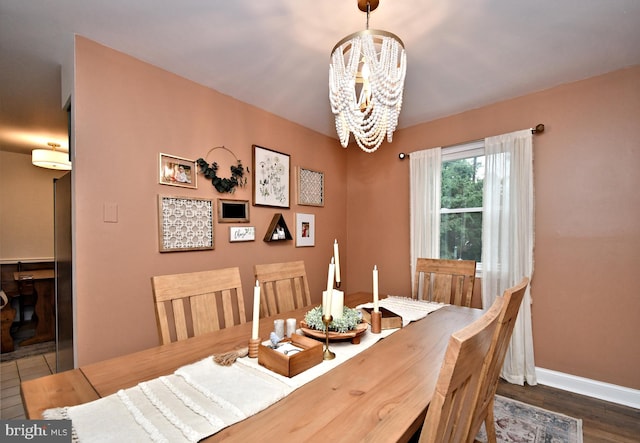 16 Grove Cir, Sellersville, PA 18960 - dining space featuring a chandelier, baseboards, and wood finished floors