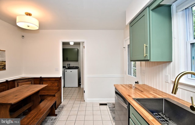 16 Grove Cir, Sellersville, PA 18960 - kitchen with wood counters, green cabinetry, a sink, and stainless steel dishwasher