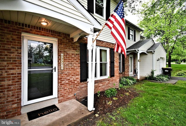 16 Grove Cir, Sellersville, PA 18960 - property entrance with brick siding and a lawn
