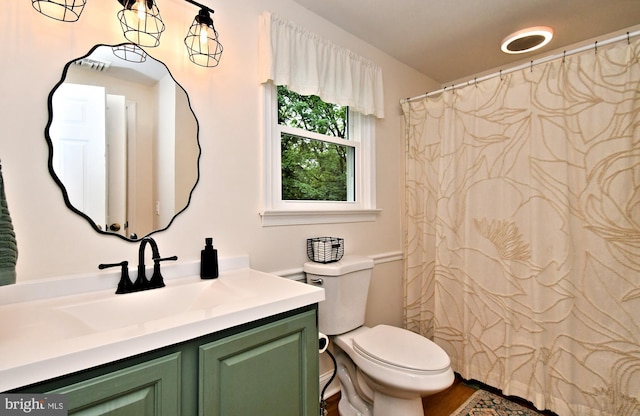16 Grove Cir, Sellersville, PA 18960 - bathroom featuring vanity, toilet, wood finished floors, and curtained shower
