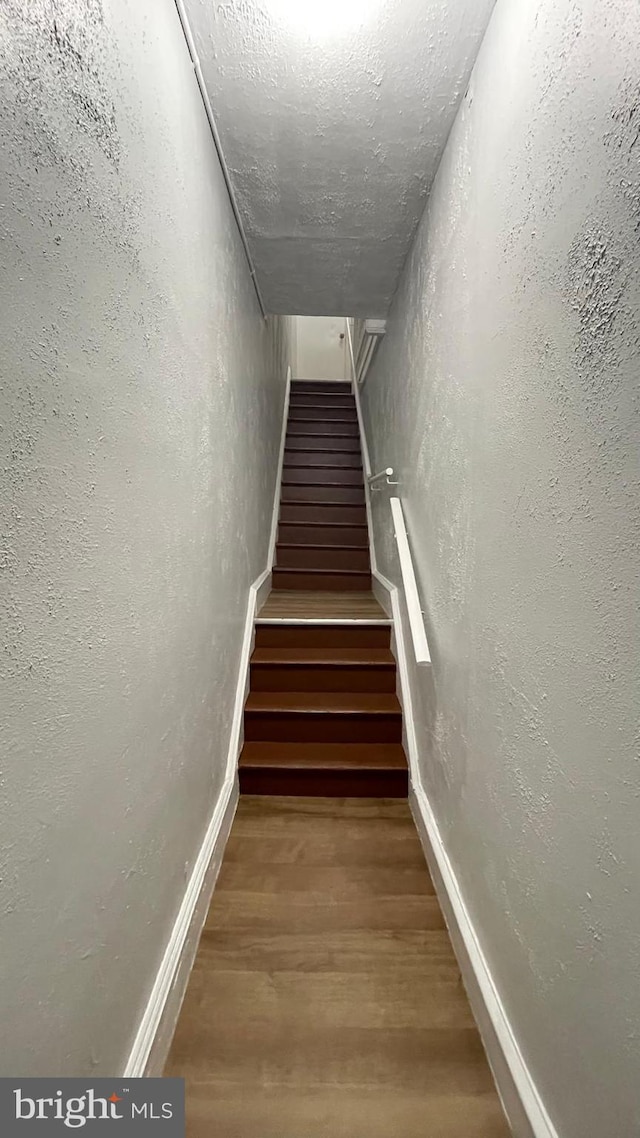 4937 N 13th St, Philadelphia, PA 19141 - stairway featuring wood finished floors and baseboards