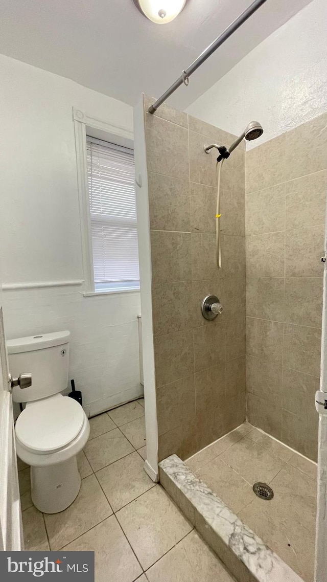 4937 N 13th St, Philadelphia, PA 19141 - bathroom with a shower stall, tile patterned floors, and toilet