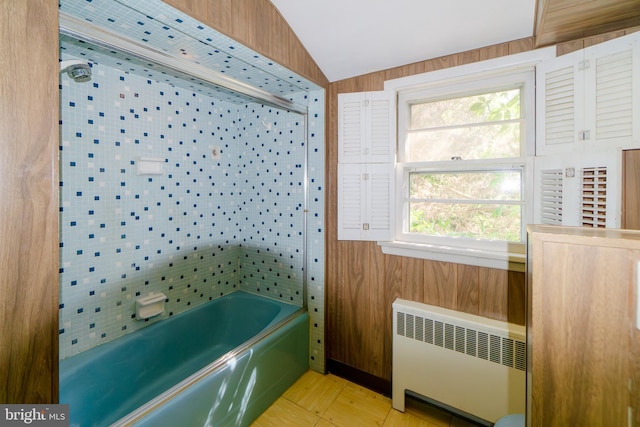 209 Berkshire Ave, Linwood, NJ 08221 - bathroom featuring radiator heating unit, washtub / shower combination, and vaulted ceiling