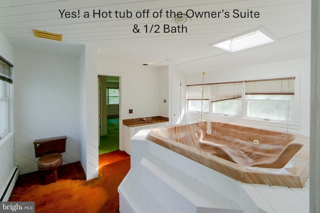 209 Berkshire Ave, Linwood, NJ 08221 - hall featuring a baseboard radiator, a skylight, a sink, and carpet