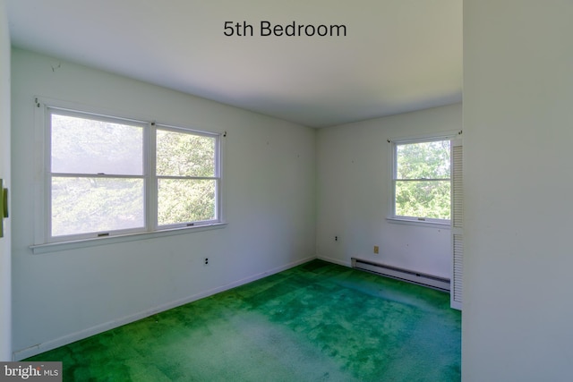 209 Berkshire Ave, Linwood, NJ 08221 - empty room with a baseboard heating unit, carpet flooring, and baseboards