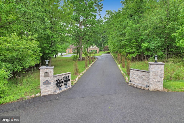 25 Mariner Ct, Ridgeley, WV 26753 - view of asphalt driveway with street lights