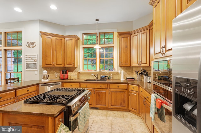 25 Mariner Ct, Ridgeley, WV 26753 - kitchen featuring appliances with stainless steel finishes, tasteful backsplash, recessed lighting, and brown cabinetry