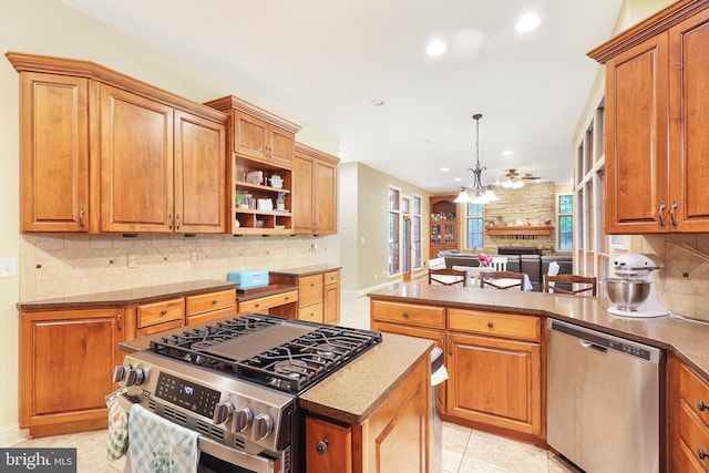 25 Mariner Ct, Ridgeley, WV 26753 - kitchen with appliances with stainless steel finishes, recessed lighting, brown cabinetry, and light tile patterned flooring