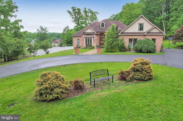 25 Mariner Ct, Ridgeley, WV 26753 - view of front of home with brick siding and asphalt driveway