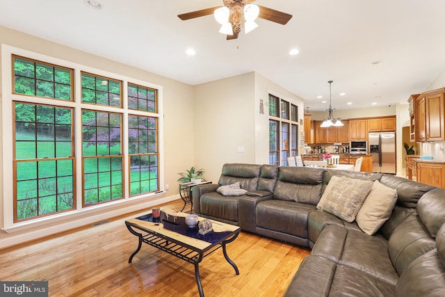 25 Mariner Ct, Ridgeley, WV 26753 - living area featuring ceiling fan, plenty of natural light, recessed lighting, light wood-style floors, and baseboards