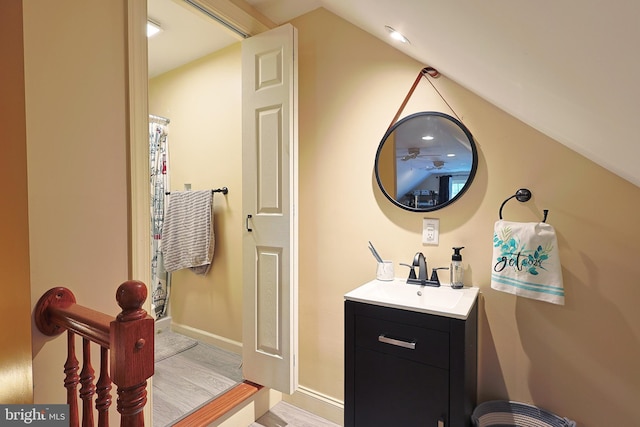 25 Mariner Ct, Ridgeley, WV 26753 - bathroom featuring vanity, vaulted ceiling, and baseboards