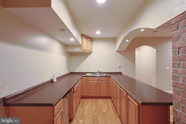 25 Mariner Ct, Ridgeley, WV 26753 - kitchen with a peninsula, dark countertops, light wood finished floors, recessed lighting, and a sink