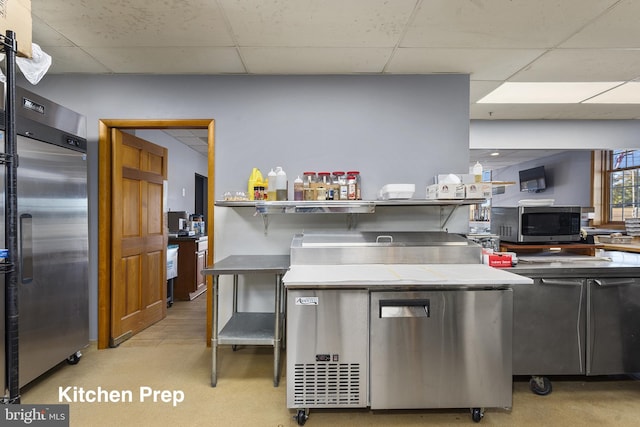 3 Howell Point Rd, Betterton, MD 21610 - kitchen with stainless steel appliances, a paneled ceiling, and light countertops