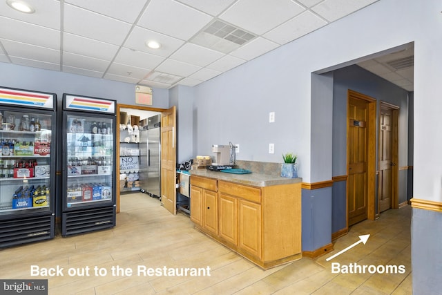 3 Howell Point Rd, Betterton, MD 21610 - bar with a drop ceiling, high quality fridge, and light wood-style floors