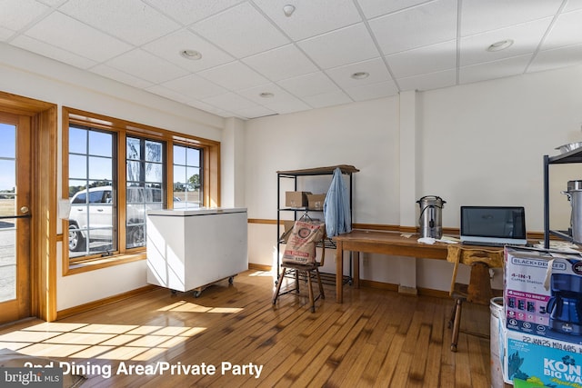 3 Howell Point Rd, Betterton, MD 21610 - home office featuring a drop ceiling, hardwood / wood-style floors, and baseboards