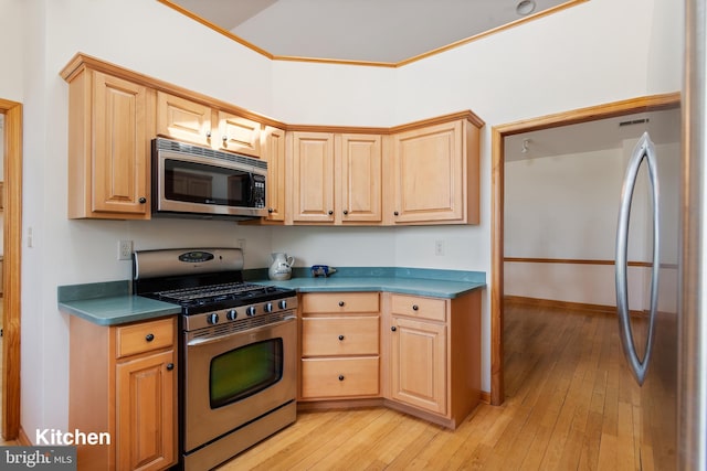 3 Howell Point Rd, Betterton, MD 21610 - kitchen with appliances with stainless steel finishes, light wood finished floors, crown molding, and light brown cabinets