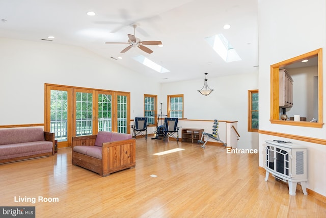 3 Howell Point Rd, Betterton, MD 21610 - living room featuring a skylight, light wood finished floors, a ceiling fan, heating unit, and recessed lighting