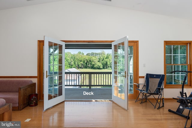 3 Howell Point Rd, Betterton, MD 21610 - doorway with french doors, wood finished floors, lofted ceiling, and healthy amount of natural light