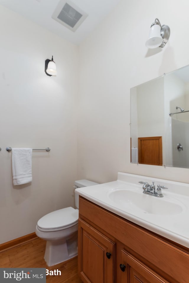3 Howell Point Rd, Betterton, MD 21610 - bathroom featuring wood finished floors, toilet, vanity, and a shower