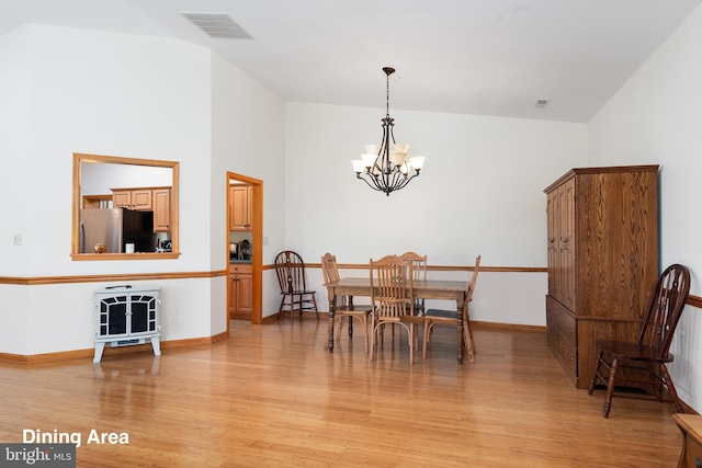 3 Howell Point Rd, Betterton, MD 21610 - dining space featuring a chandelier, light wood-style floors, baseboards, and high vaulted ceiling