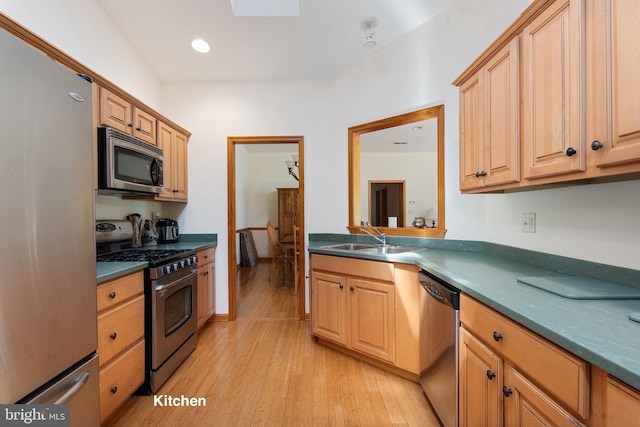 3 Howell Point Rd, Betterton, MD 21610 - kitchen with stainless steel appliances, a sink, light wood-style flooring, dark countertops, and recessed lighting
