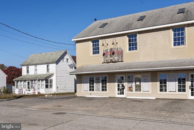 3 Howell Point Rd, Betterton, MD 21610 - back of property with stucco siding and roof with shingles