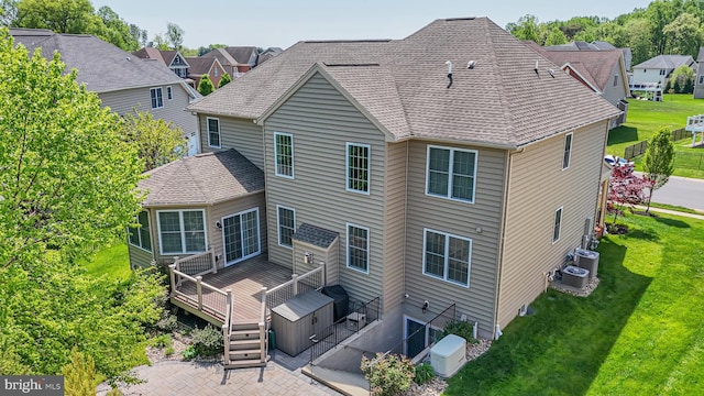 1504 Willow Branch Way, Severn, MD 21144 - back of house with a wooden deck, a lawn, and a residential view