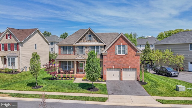1504 Willow Branch Way, Severn, MD 21144 - view of front of property featuring brick siding, driveway, a front lawn, and a porch