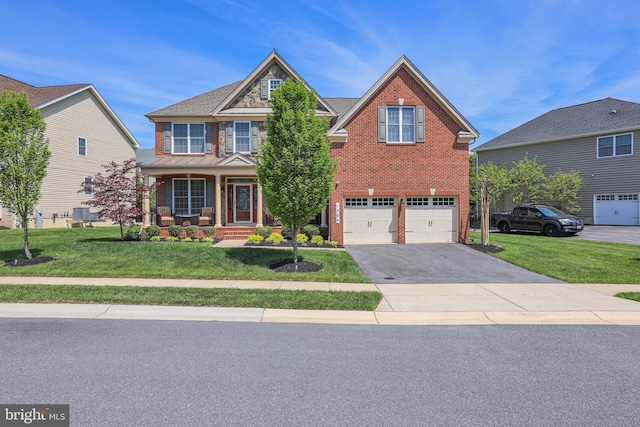 1504 Willow Branch Way, Severn, MD 21144 - view of front of house with brick siding, driveway, a front lawn, an attached garage, and covered porch