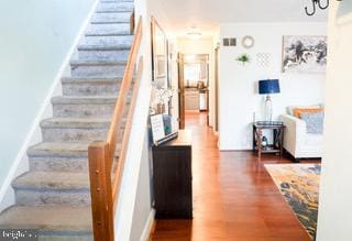 22 Erbitea Ln, New Castle, DE 19720 - staircase featuring wood finished floors and baseboards