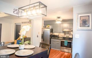 22 Erbitea Ln, New Castle, DE 19720 - dining space with wood finished floors and ceiling fan