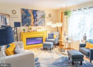 22 Erbitea Ln, New Castle, DE 19720 - living area with a glass covered fireplace
