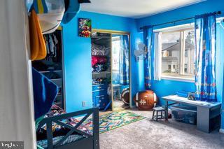 22 Erbitea Ln, New Castle, DE 19720 - bedroom featuring carpet flooring