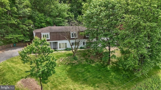 1236 Wood Rd, Hummelstown, PA 17036 - colonial inspired home featuring a gambrel roof, a front yard, and driveway