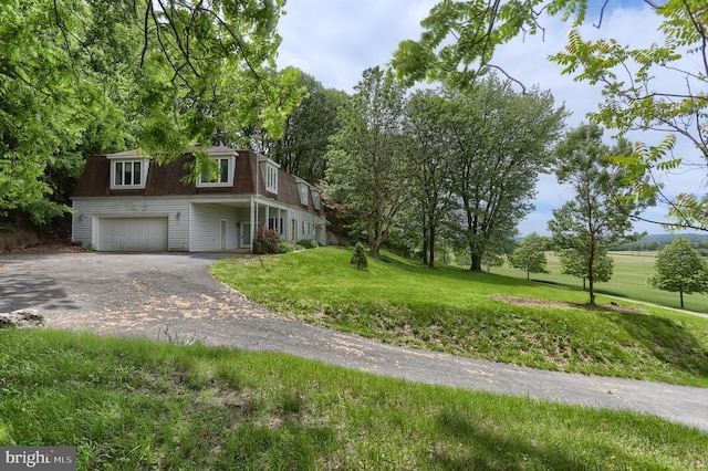 1236 Wood Rd, Hummelstown, PA 17036 - view of front of property featuring an attached garage, driveway, a front lawn, and roof with shingles