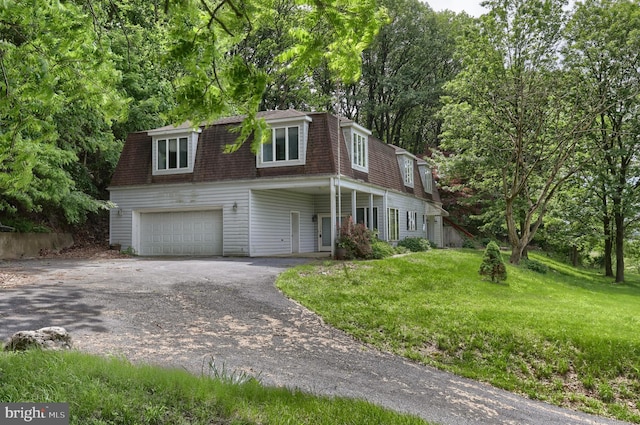 1236 Wood Rd, Hummelstown, PA 17036 - colonial inspired home featuring a shingled roof, asphalt driveway, mansard roof, and a front lawn