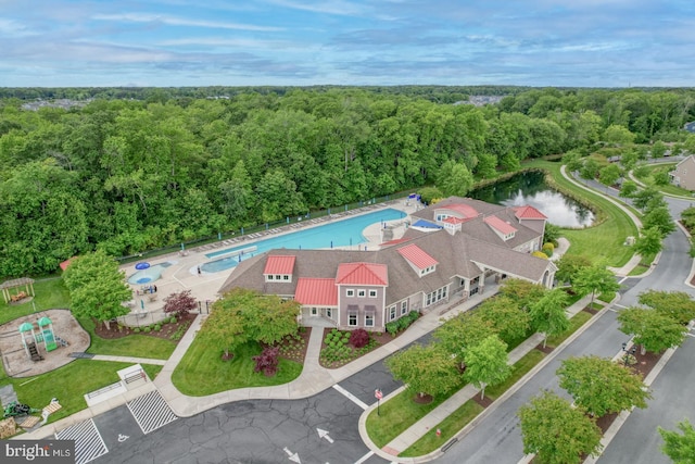 38623 Longs Chapel Ln, Millville, DE 19967 - aerial view of a forest, a pool area, and a nearby body of water