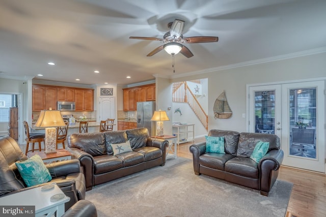 38623 Longs Chapel Ln, Millville, DE 19967 - living room featuring stairs, ceiling fan, recessed lighting, crown molding, and light wood-type flooring