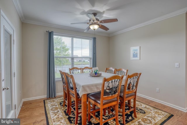 38623 Longs Chapel Ln, Millville, DE 19967 - dining room with a ceiling fan, light wood-style flooring, ornamental molding, and baseboards