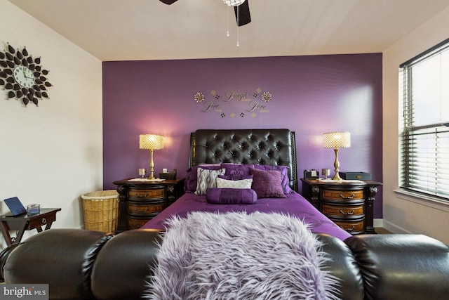 45394 Daveno Sq, Sterling, VA 20164 - bedroom featuring an accent wall, baseboards, and ceiling fan